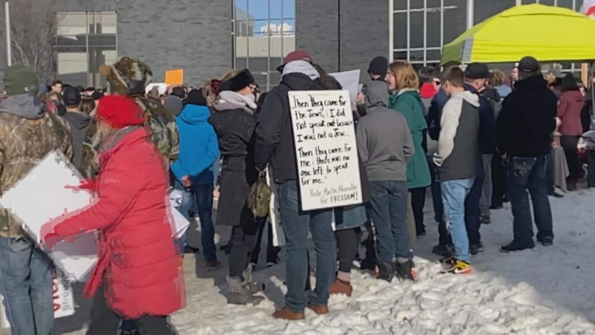 Protesters outside of the Edmonton Remand Centre on Feb. 20, 2021.