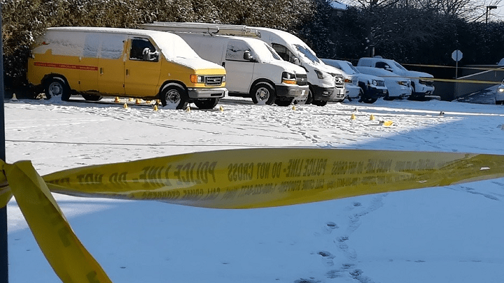 Evidence markers are seen at the scene of a fatal shooting in Scarborough.