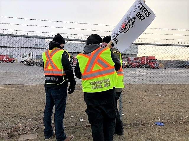 Union workers at Calgary Coca-Cola plant walk off the job - image