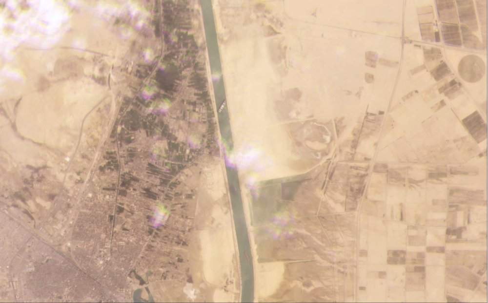 Massive ship stuck in Suez Canal continues to harm global shipping - image