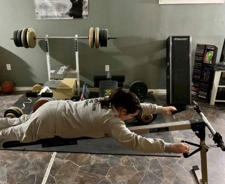 Krystal Shaw, 27, trains at home on her swim bench.
