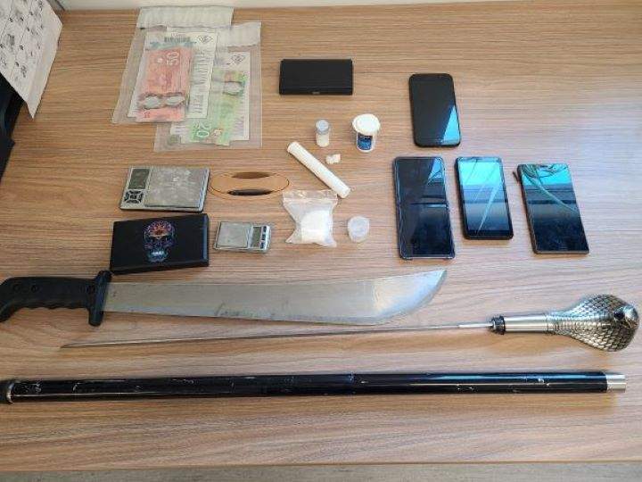 Officers say they seized cocaine, Canadian money and an ornate cane with a cobra head that reveals a narrow sword when unscrewed.