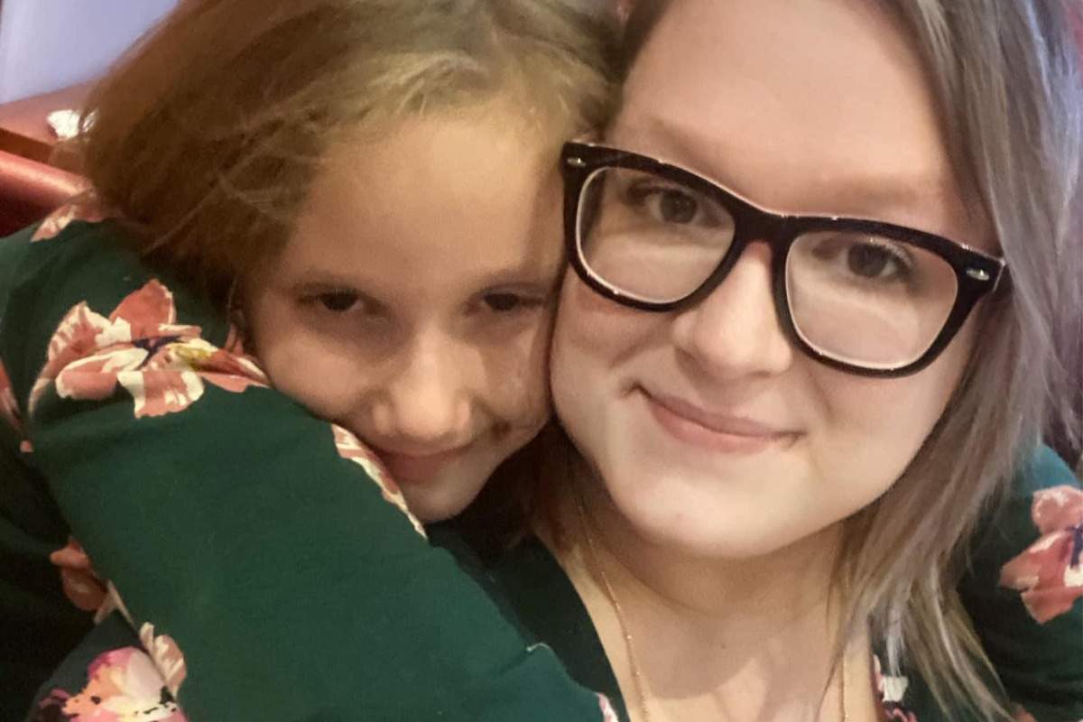 Amberlee Hill shares a smile with her nine-year-old daughter.