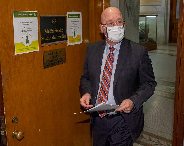 Minister of Municipal Affairs and Housing Steve Clark arrives to make an announcement in the Ontario Legislature, in Toronto, Monday, Dec. 7, 2020. 