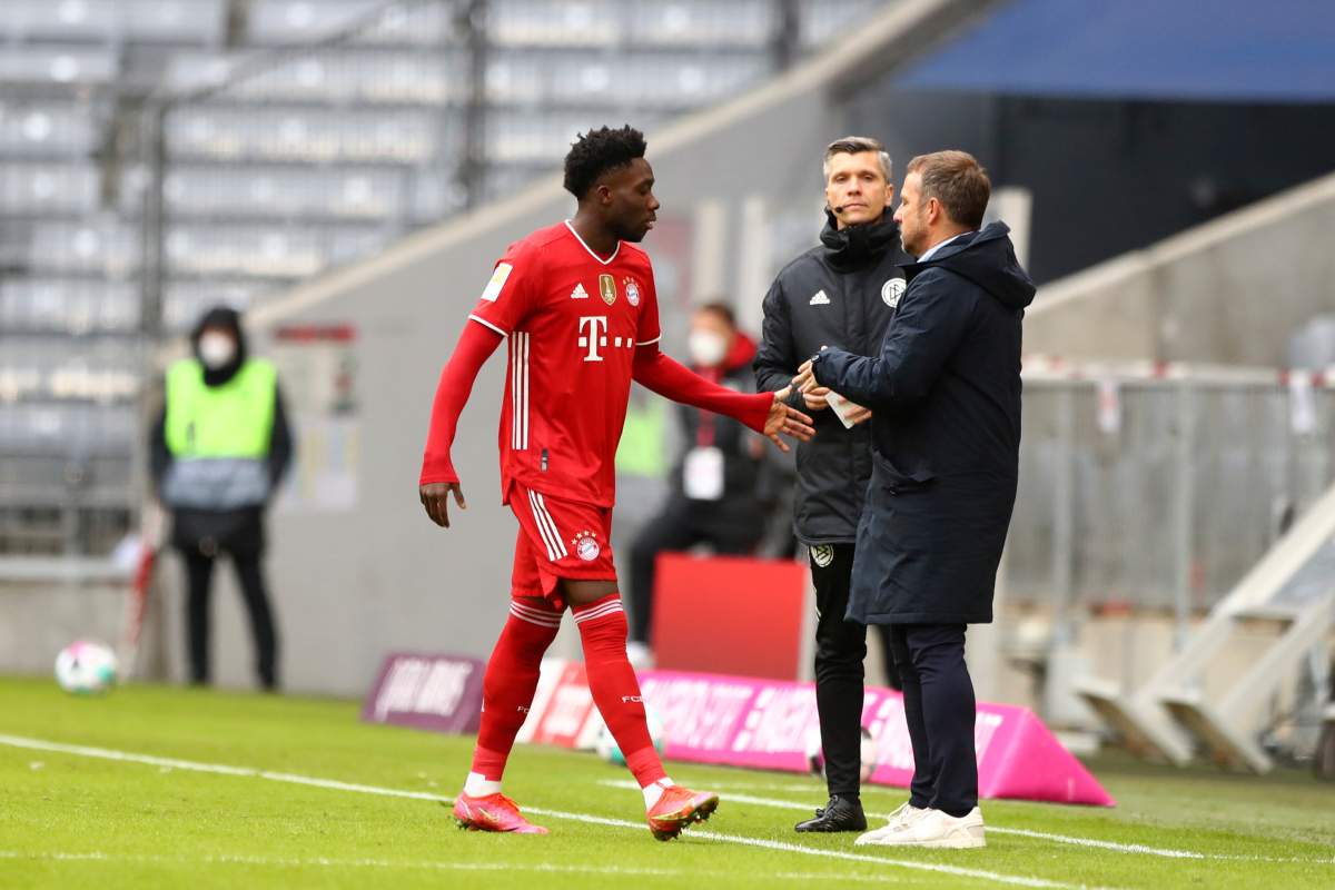 Bayern’s Alphonso Davies leaves the pitch after receiving a red card during the German Bundesliga soccer match between FC Bayern Munich and VfB Stuttgart in Munich, Germany, Saturday, March 20, 2021.