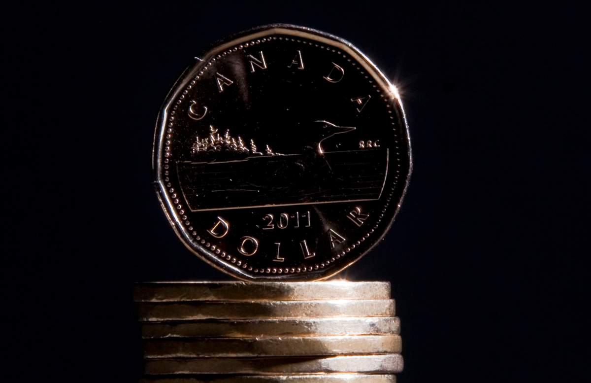 Canadian dollars are pictured in Vancouver on September 22, 2011.