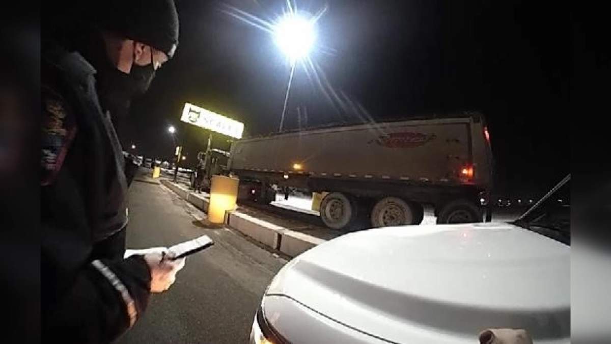 Police say a semi driver is facing over $7,000 in fines and had his licence suspended after being caught over the weight limit and with open beer in his cab.