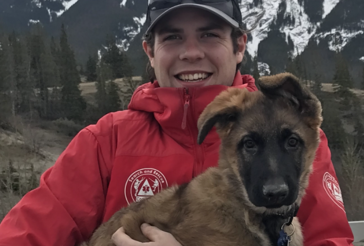 Isaac Heisler with Diez the puppy. Photo submitted.