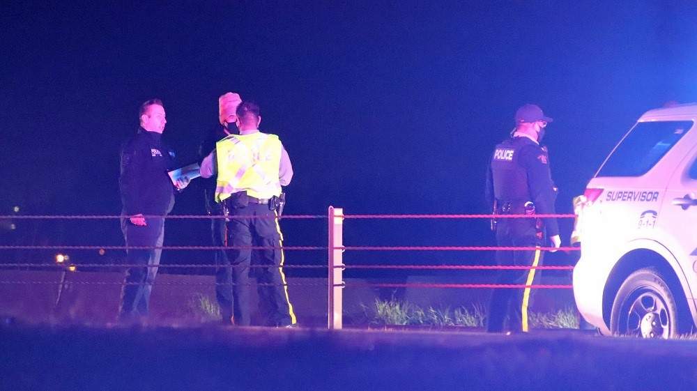Surrey RCMP officers on scene following a shooting on Highway 99 Monday night.