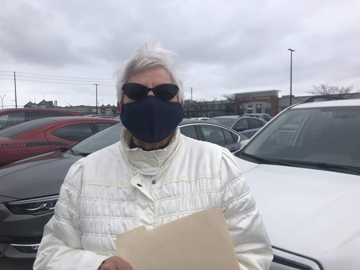 Ellen Trafagander, who is in her 80s before getting vaccinated at the Western Fair Agriplex Saturday. March 6, 2021