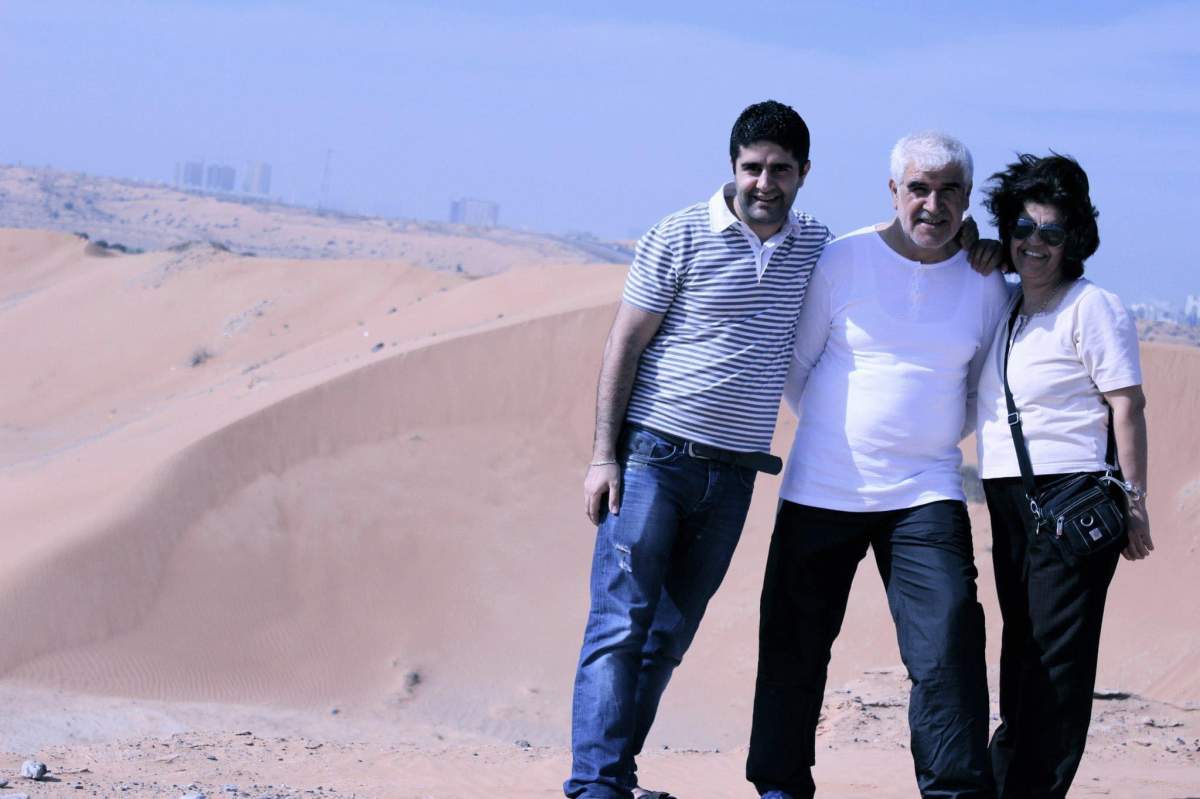 Sam Faissal, left, pictured with his parents years ago on a family vacation. Faissal says his father, who is now in his 60s and was preparing for his retirement, has had his life savings blocked by the bank. 