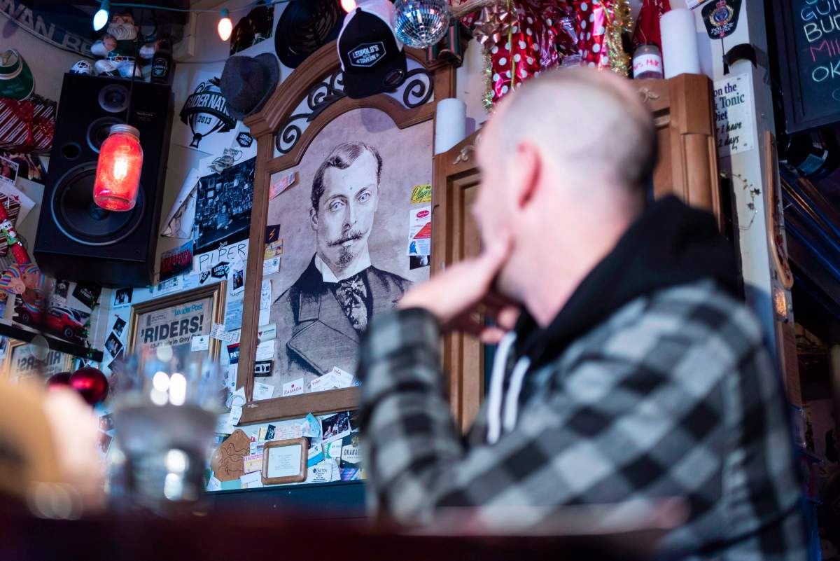 Regional manager AJ Schepers looks over at the portrait of Leopold George Duncan Albert at Leopold’s Tavern in Regina, Saskatchewan on Thursday, Jan. 3, 2019. The Regina-founded bar chain is named after Prince Leopold, the youngest son of Queen Victoria.