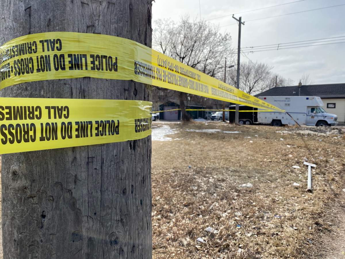 Winnipeg police at the site of a homicide on Stella Avenue Wednesday.