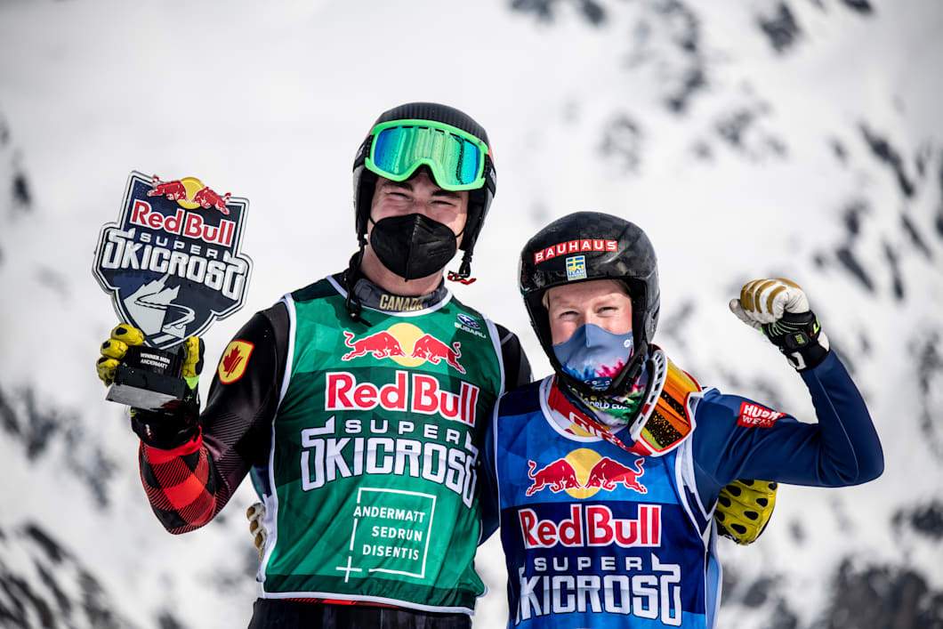 Reece Howden, left, and Sandra Naeslund gather for a photo on Saturday after winning their respective skicross races on Saturday.
