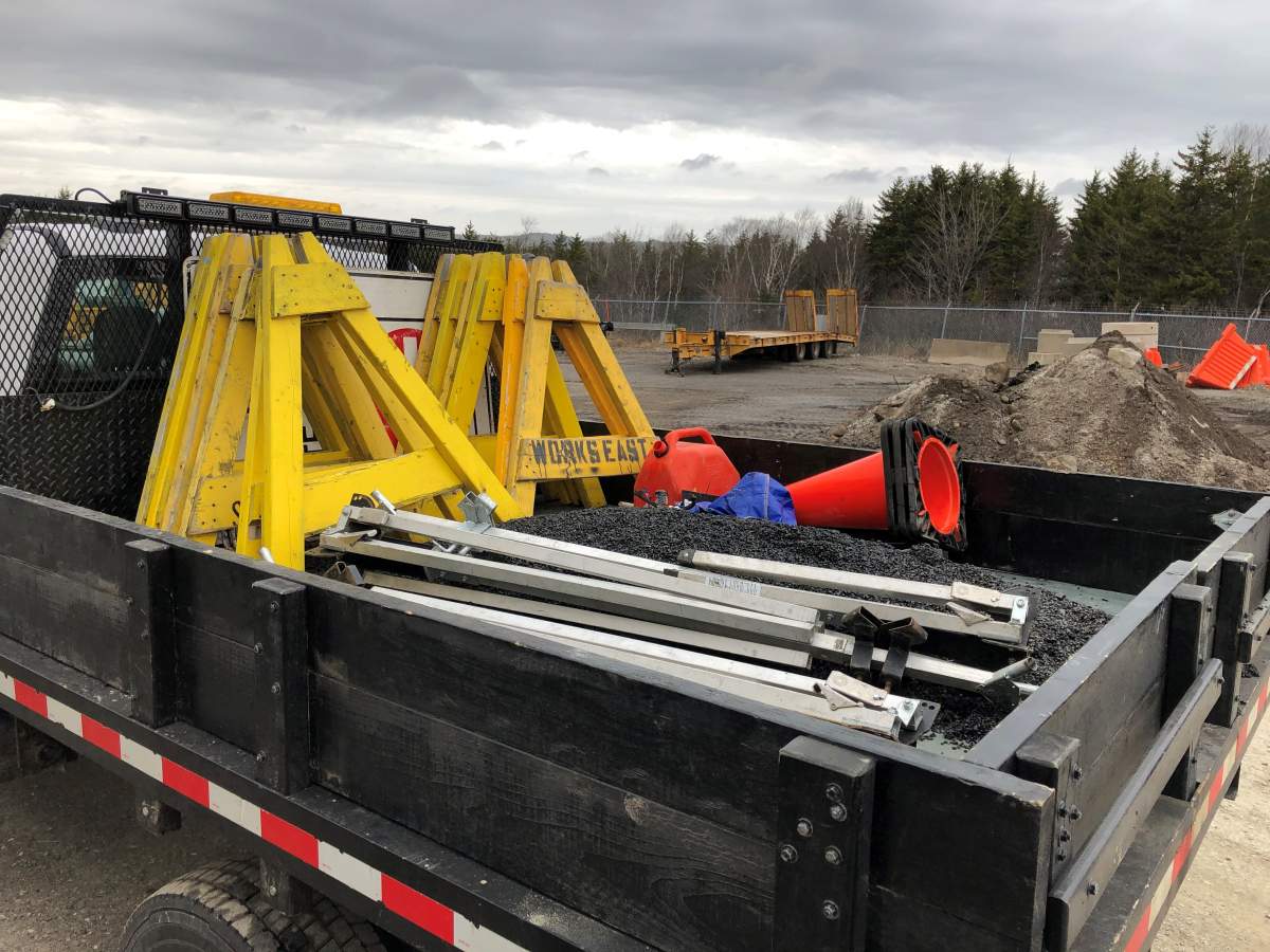 A public works truck in Saint John, N.B., is loaded with barricades and signs as the city prepares for expected heavy rainfall.