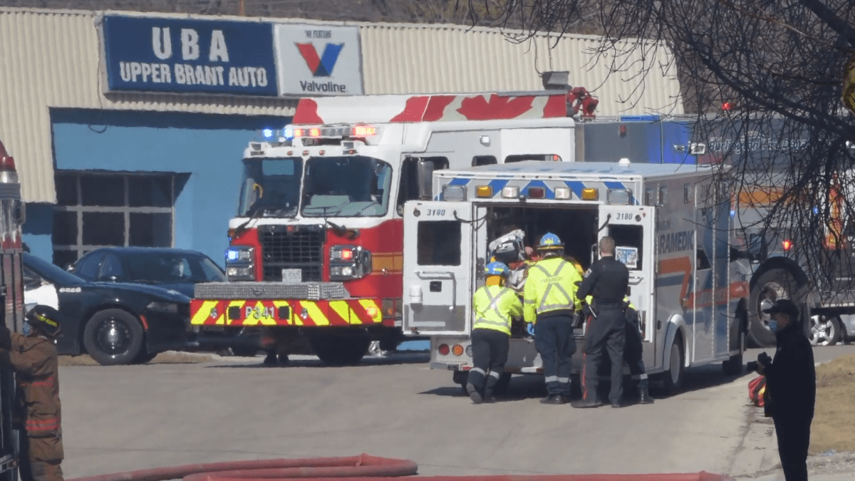 Halton paramedics transport man to hospital during building blaze on Pettit Road in Burlington. (March 12, 2021)