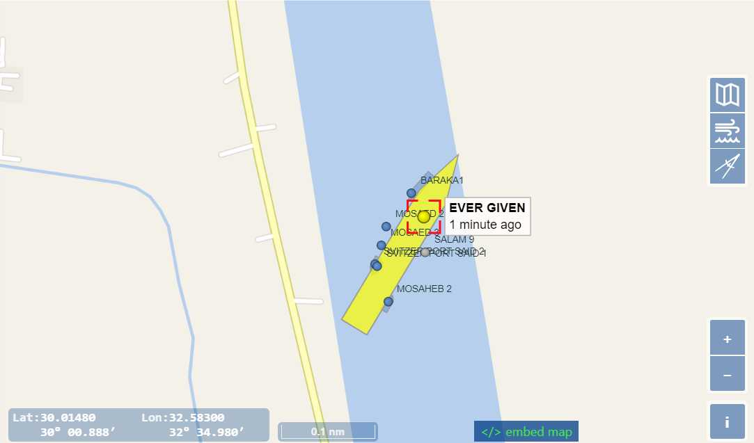 A screenshot of the site VesselFinder shows the Ever Given shipping