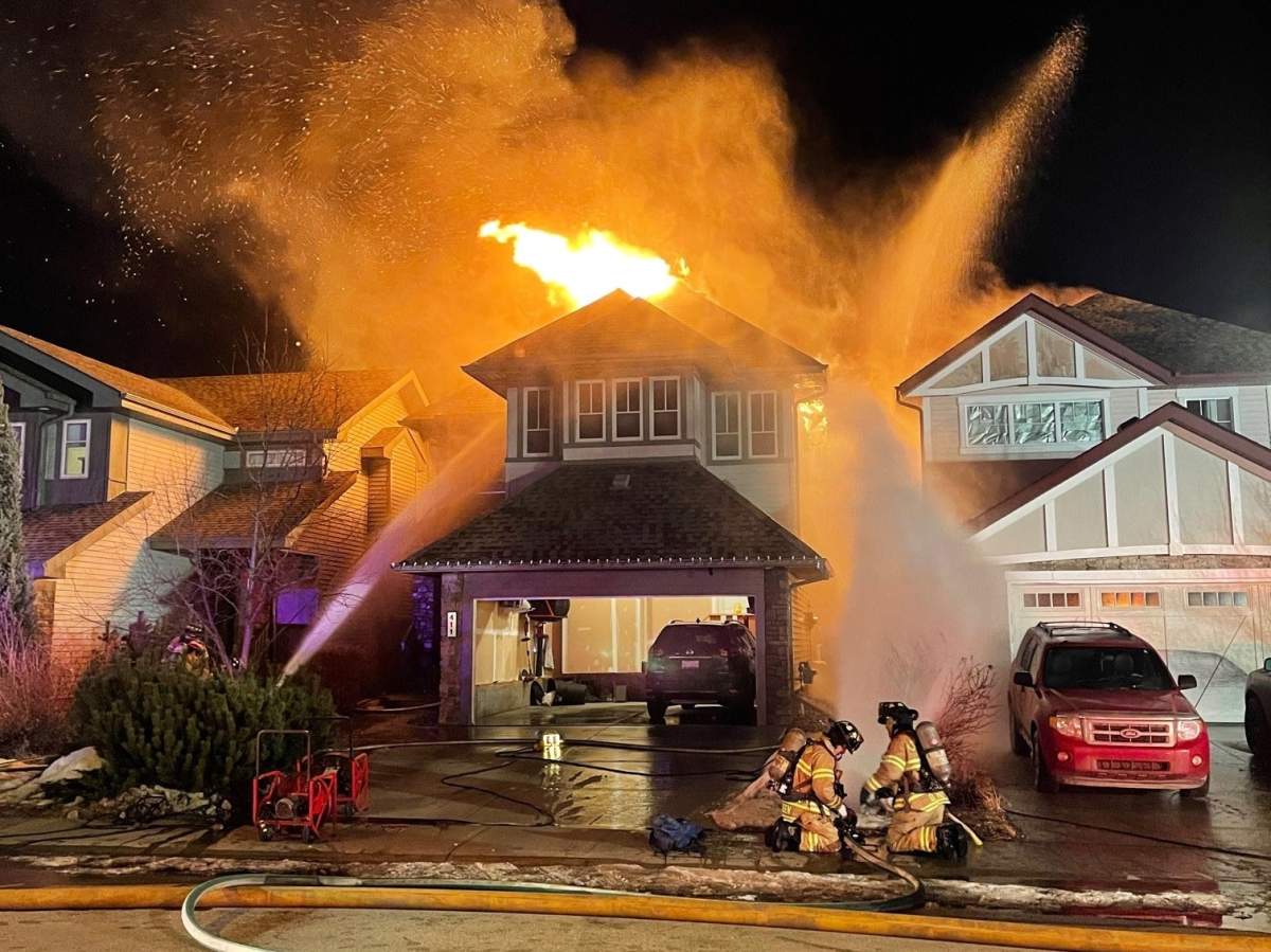 Edmonton Fire Services respond to a house fire at around 4:20 a.m. on Tuesday.