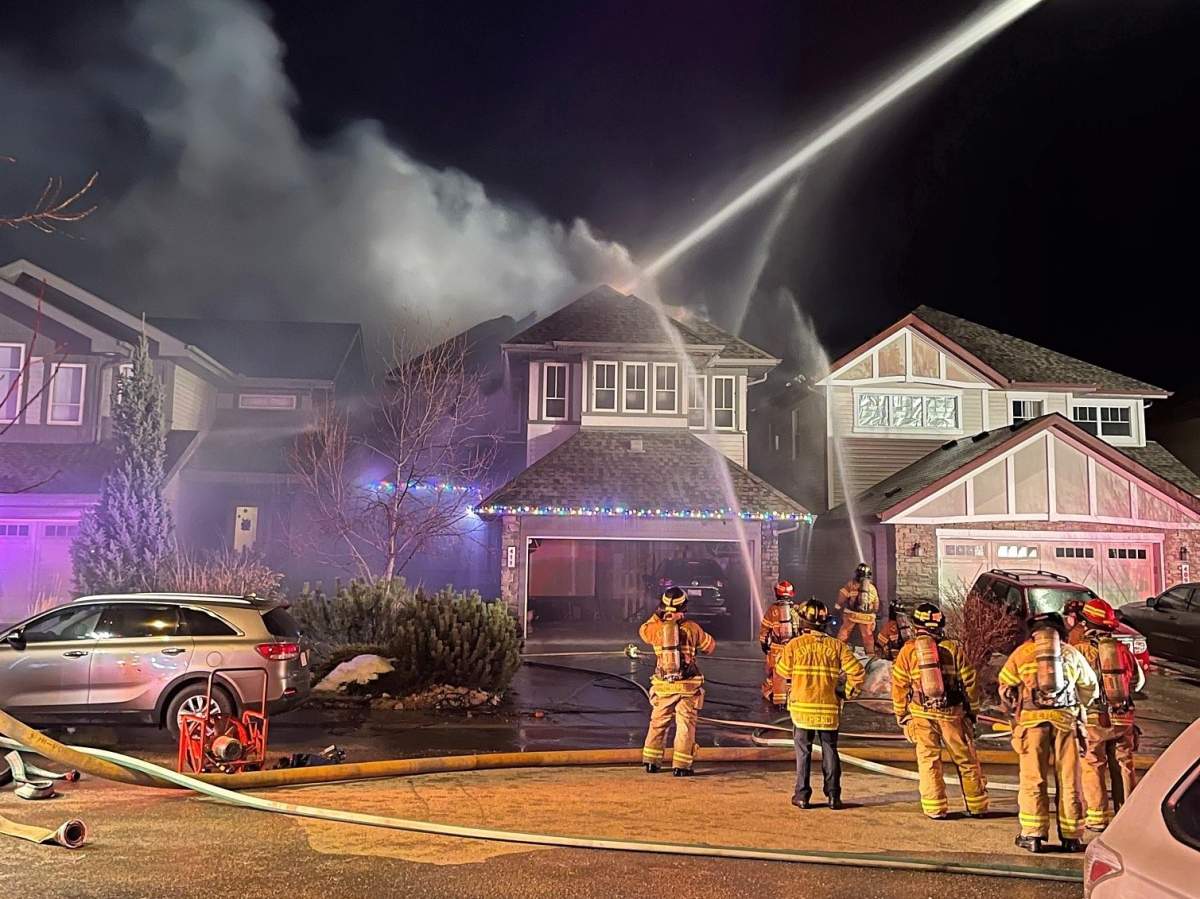 Edmonton Fire Services respond to a house fire at around 4:20 a.m. on Tuesday.