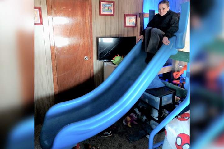 Det. Julie Lee is shown on a missing playground slide inside a suspect's mobile home in Burbank, Wash., in this image released on March 9, 2021. 