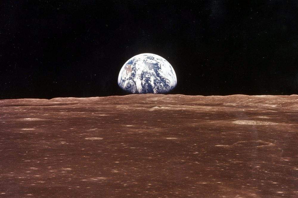 Earth is shown from the moon during the Apollo 11 mission.