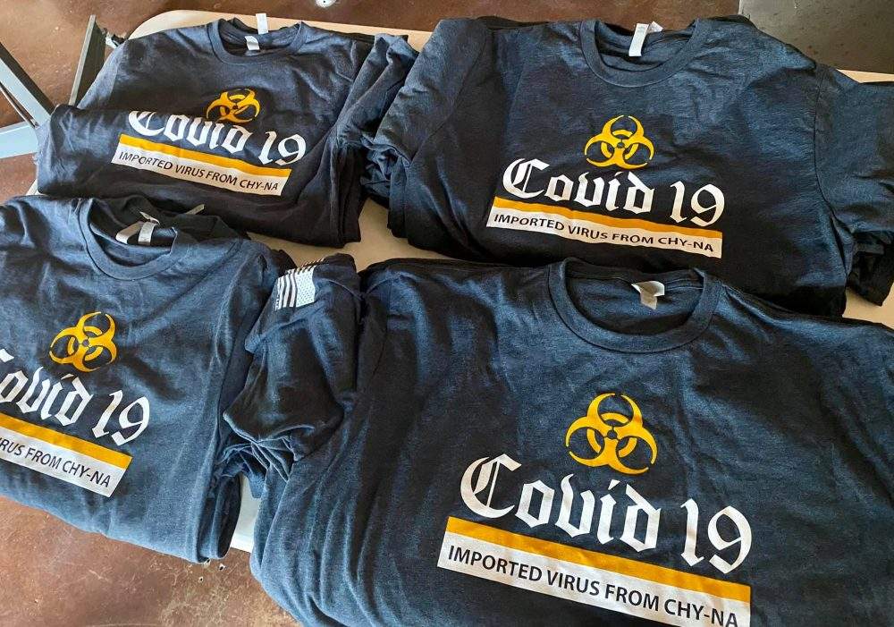 T-shirts bearing an anti-China slogan are shown in this photo captured from Jay Baker’s Facebook page on April 2, 2020.