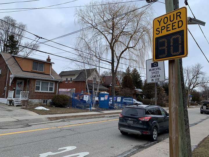 A photo of Stanley Avenue in Toronto warning that a municipal speed camera is in use.