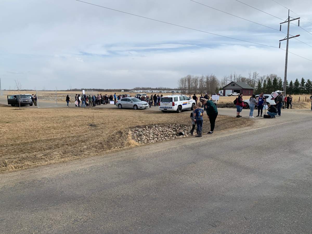 RCMP and Alberta health officers fence off GraceLife Church west of Edmonton on Wednesday, April 7, 2021.