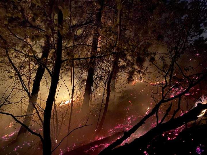 Firefighters were busy on Tuesday night, battling a ground fire on the east side of Osoyoos Lake.