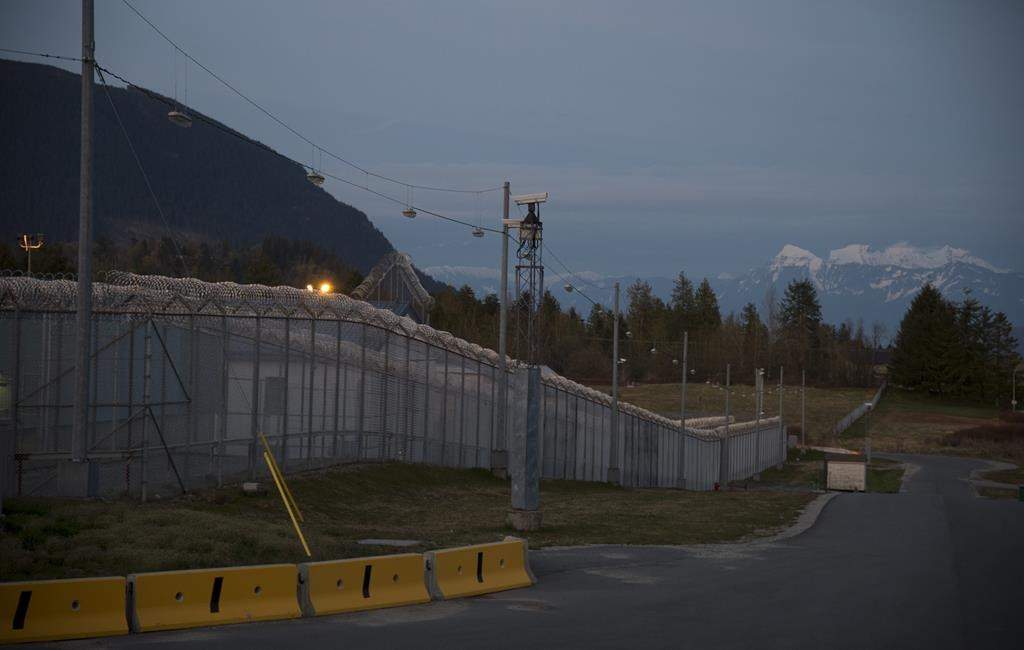 The lockdown at the Mission Institution continues Friday due to fears a drone may have dropped a firearm over the wall.