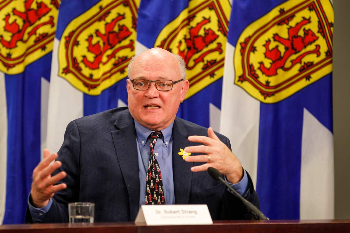 Nova Scotia's chief medical officer Dr. Robert Strang speaks with reporters during a COVID-19 briefing on April 1, 2021 in Halifax.