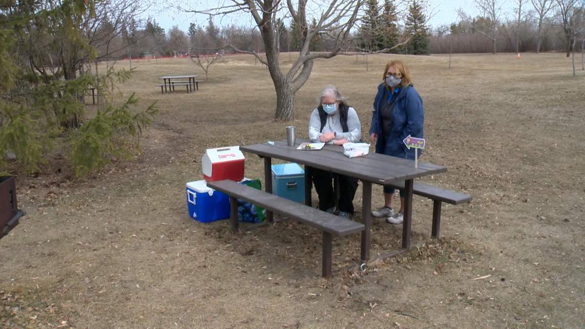Members of the Saskatoon Rotary Club at the Forestry Farm waiting to hand out Easter goody bags.