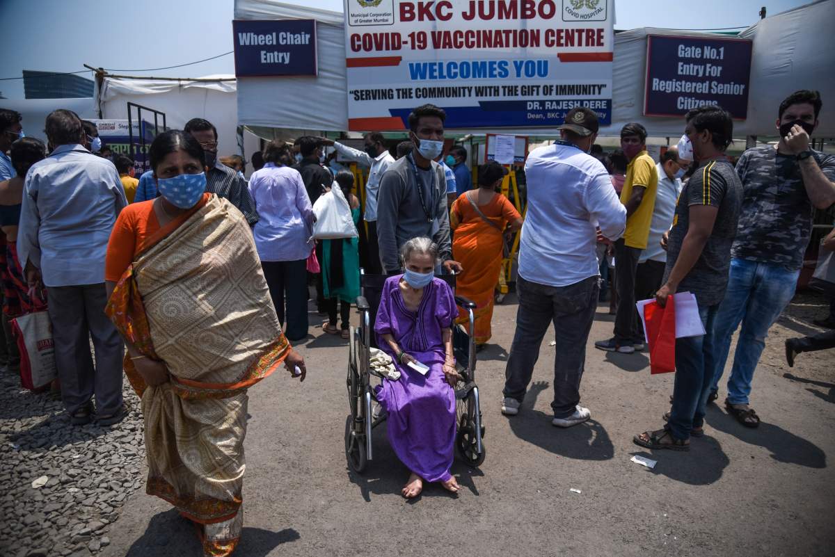 People arrive to receive their Covid-19 vaccines at a mass vaccination center on April 29, 2021 in Mumbai, India.