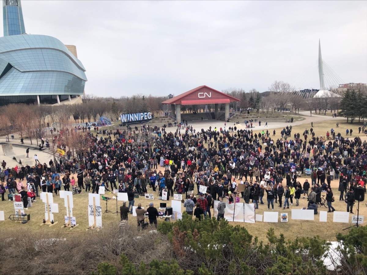 Hundreds of mostly-maskless Manitobans crowded the grounds at The Forks Sunday in protest of COVID-19 restrictions. On Monday the province said enforcement of public health orders saw a 167 spike last week, driven by tickets for gatherings.