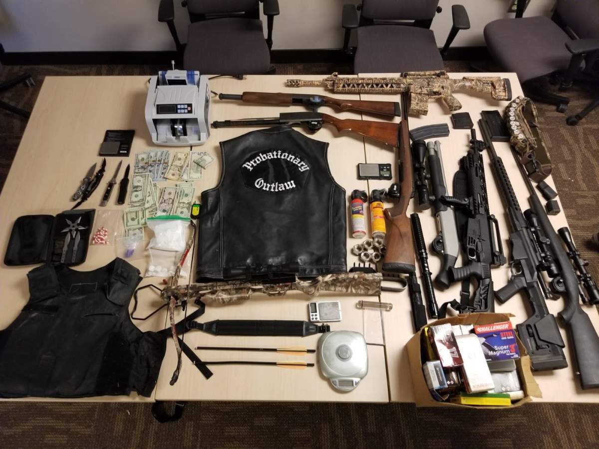 After months of investigation, Kingston police, along with OPP and Durham police, made multiple arrests and seized items from several locations, including an Outlaws MC club. 
