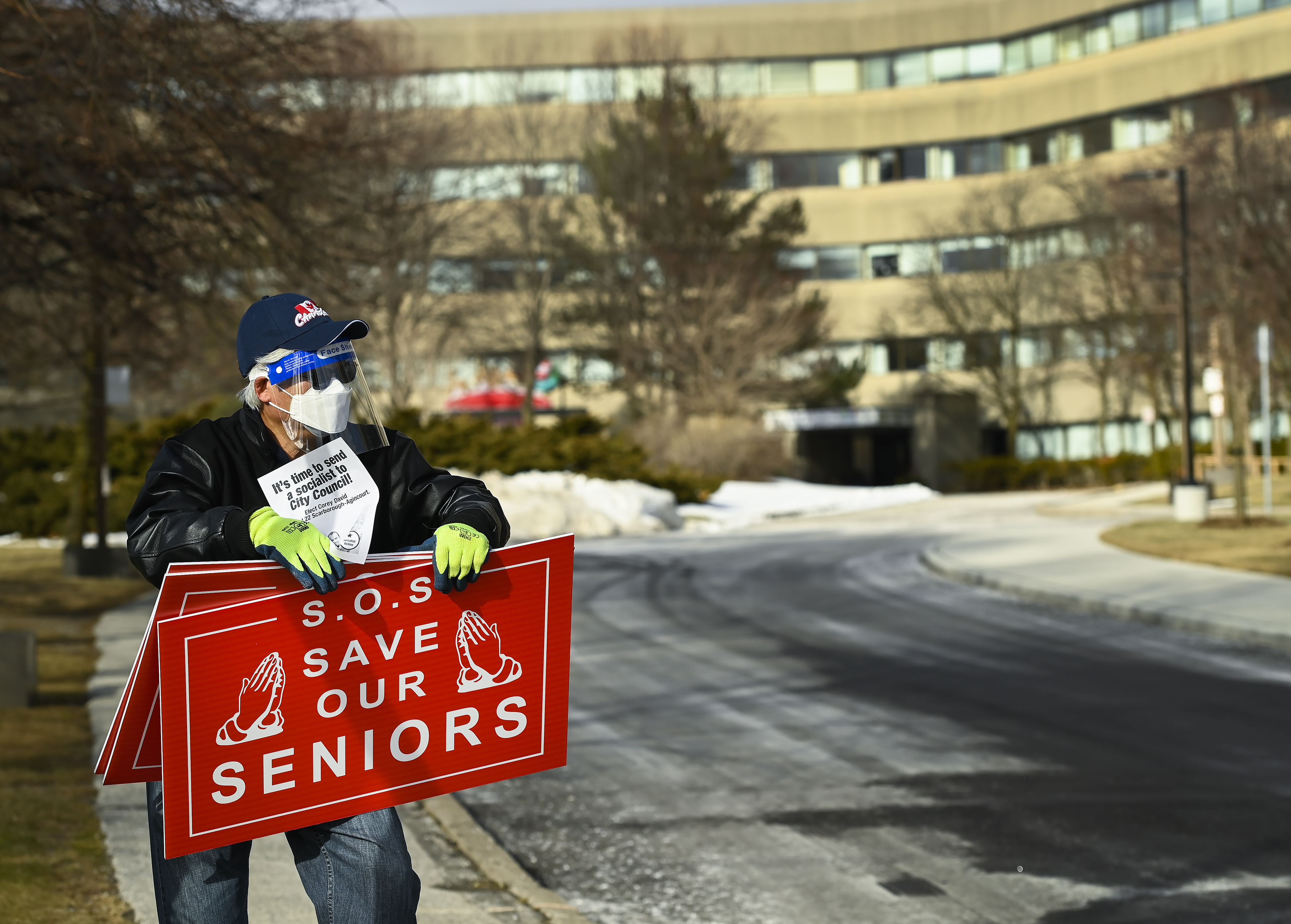 A man protests outside the Tendercare Living Centre long-term-care facility during the COVID-19 pandemic in Scarborough, Ont., on Dec. 29, 2020. The LTC home was hit hard by the coronavirus during the second wave.