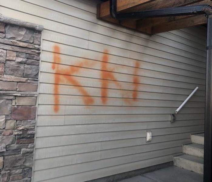 Graffiti seen on the side of a home in northwest Calgary.