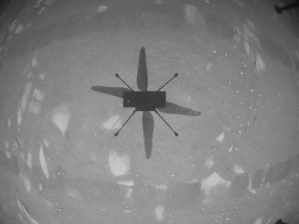 Ingenuity’s shadow is shown on the surface of Mars on Apr. 19, 2021.