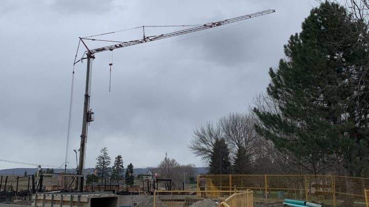 Numerous homes in Kelowna are still evacuated following a condo fire on Tuesday morning because of this construction crane.