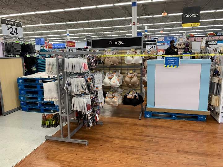 Inside of a Walmart in Toronto blocking off non-essential items under new Ontario-wide restrictions.