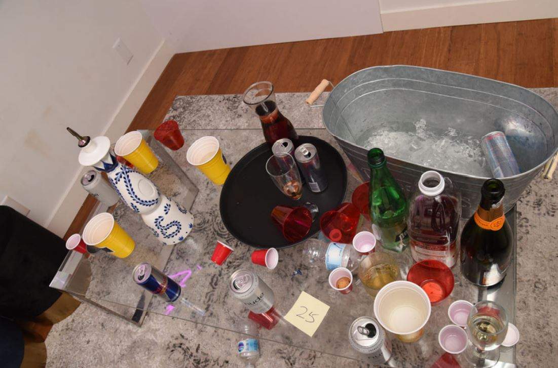 Drinks and a tub of ice inside a makeshift condo nightclub in Vancouver on Jan. 31