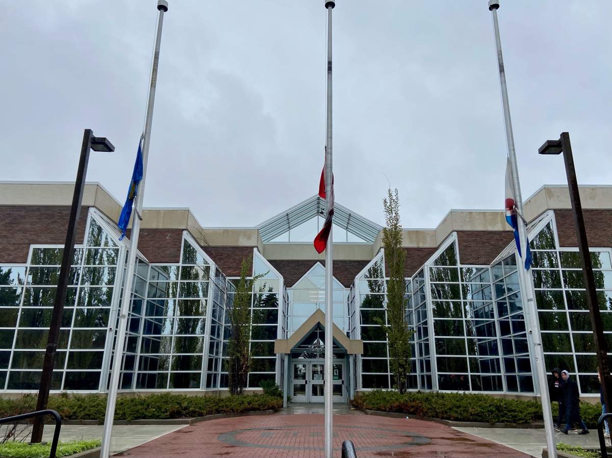 Flags were lowered at Bellerose Composite High School in St. Albert, Alta. on Tuesday, May 18, 2021.