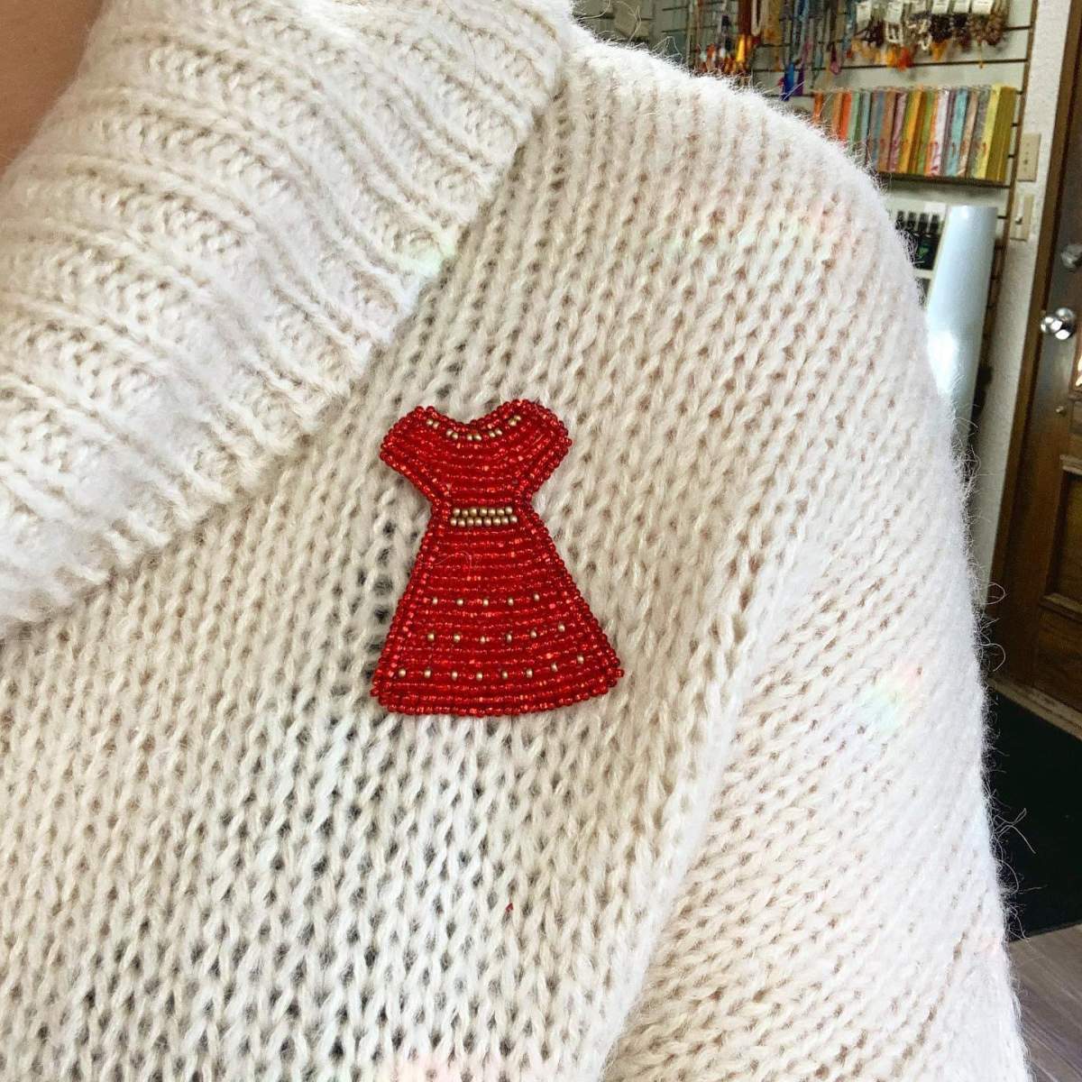 Aware House Books in Regina is selling red dress pins to raise awareness and money.