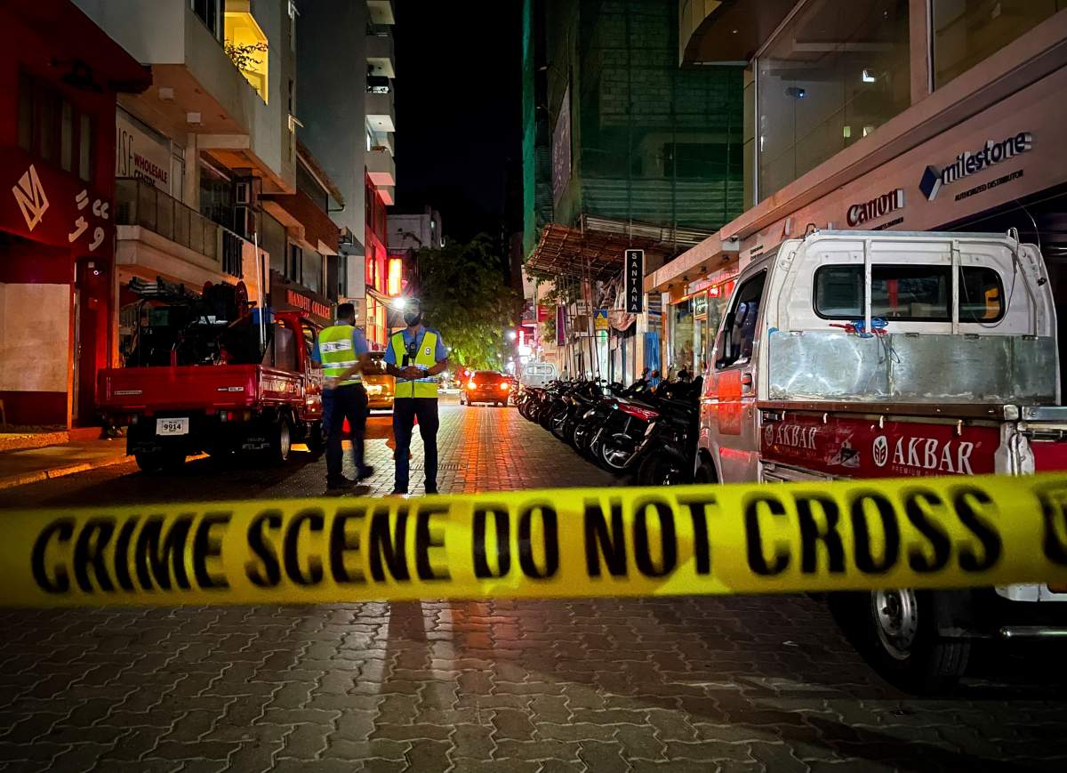 Maldivian police officers secure the area following a blast in Male, Maldives, Thursday, May 6, 2021.