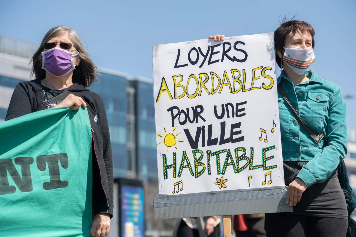 People take part in a demonstration calling for more social and affordable housing in Montreal, Saturday, April 24, 2021. 