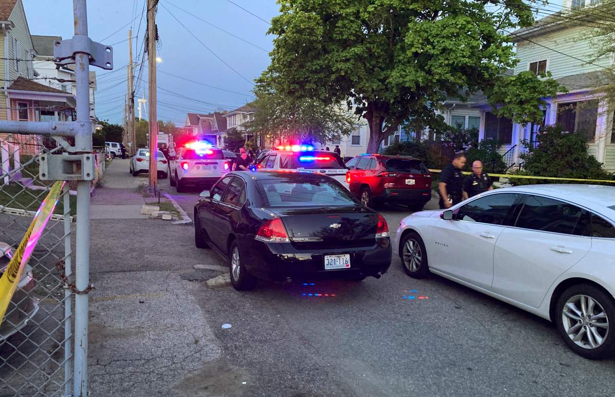 Authorities respond to the scene where multiple people were wounded in a shooting, Thursday, May 13, 2021, in Providence, R.I. (AP Photo/William J. Kole).