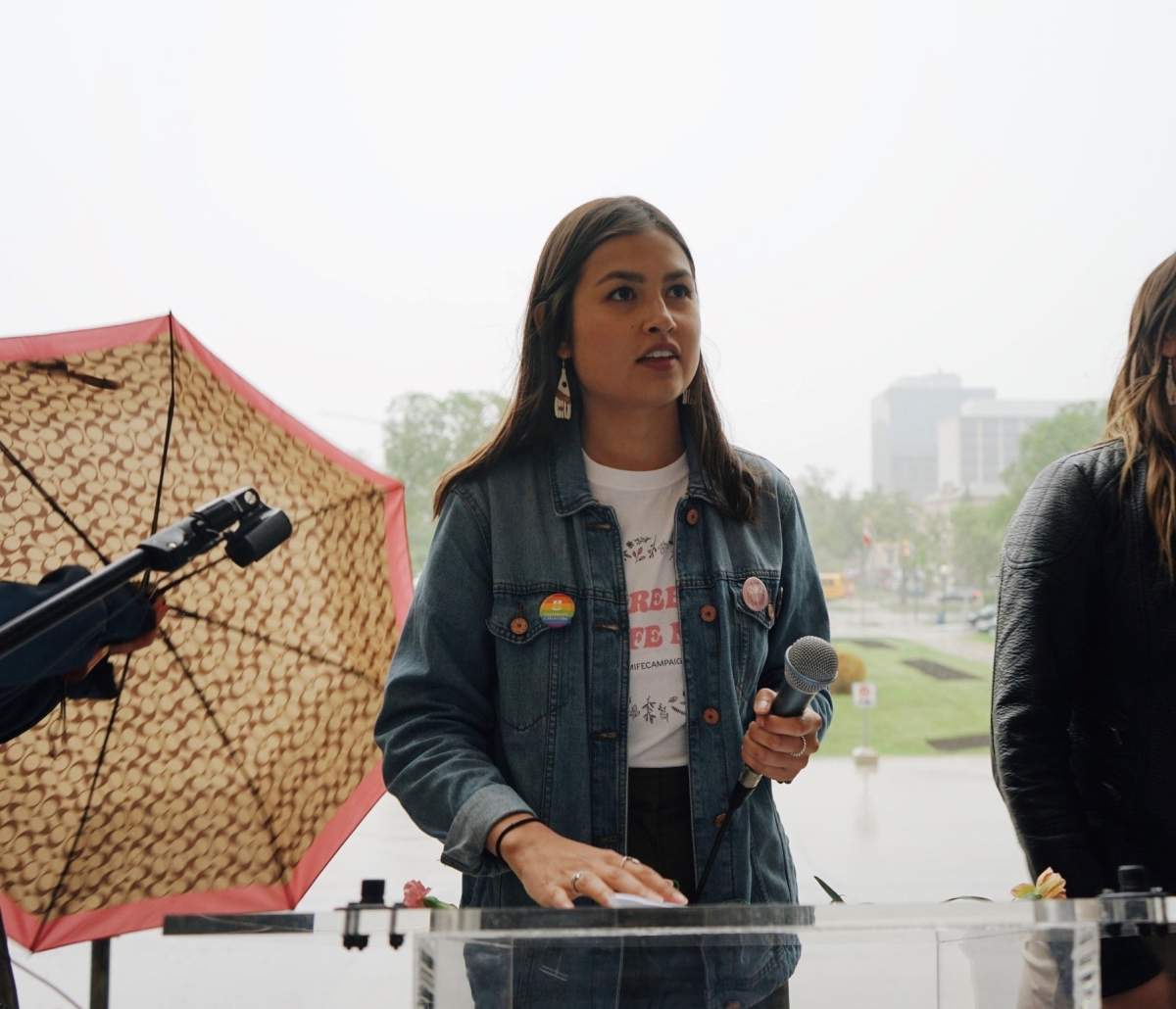 Brooke Cochrane speaks during a rally at the Manitoba Legislature to press for universal coverage of the medical abortion pill Mifegymiso, which was ultimately successful.