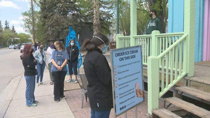 Patrons line up outside of Dessart Sweets in Regina. 