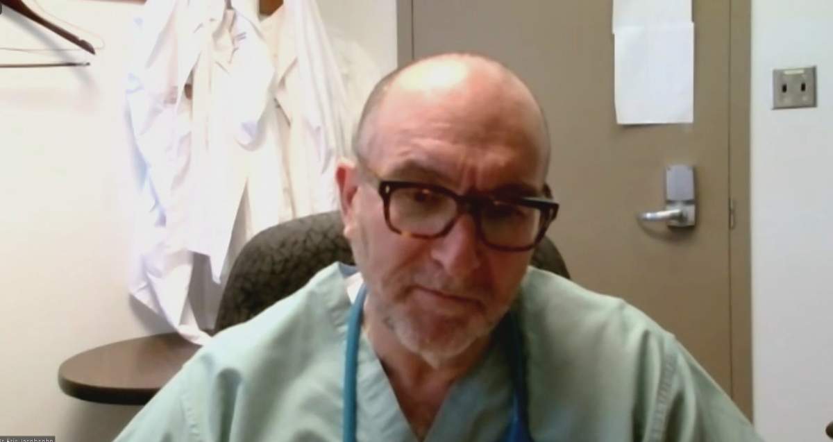 A screengrab of Dr. Eric Jacobsohn speaking about the unfolding crisis in the health care system Tuesday.