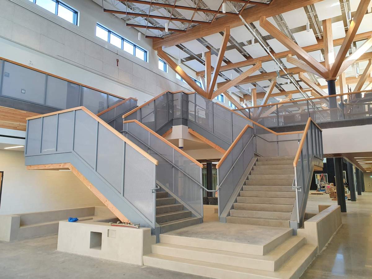The main hallway stairwell at Dr. Anne Anderson School, a new high school in southwest Edmonton’s Heritage Valley area.